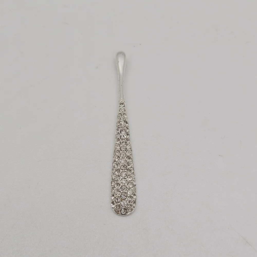 silver tone long skinny teardrop pendant with rhinestones
